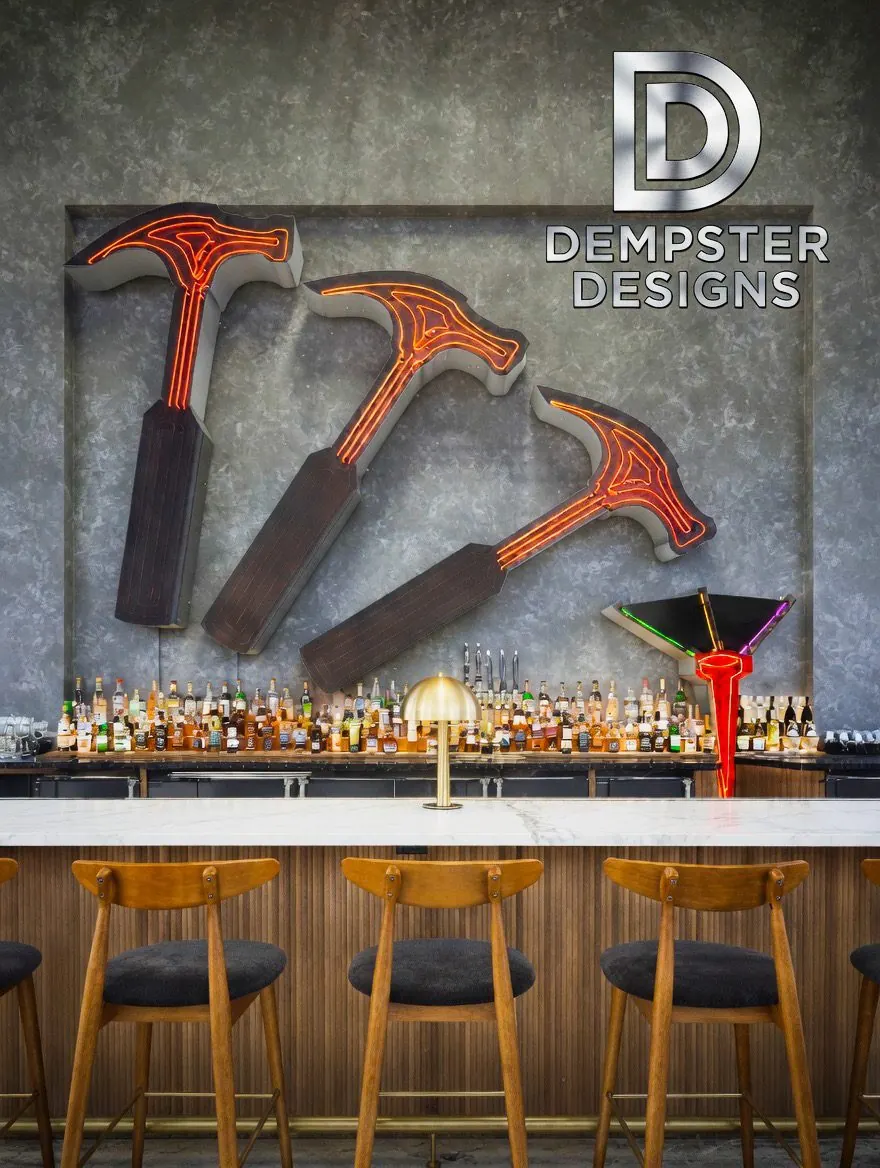 Bar interior with neon hammer wall art