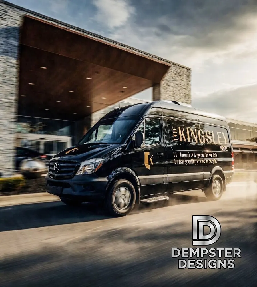 Transport van in motion near entrance