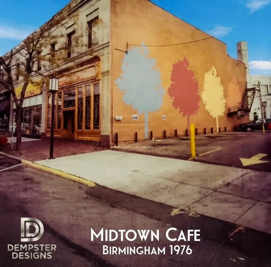 Corner brick cafe with colorful tree mural
